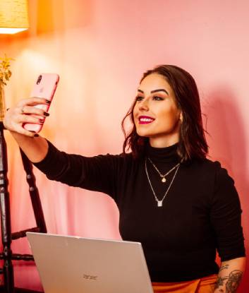 A marketing influencer posing for a selfie